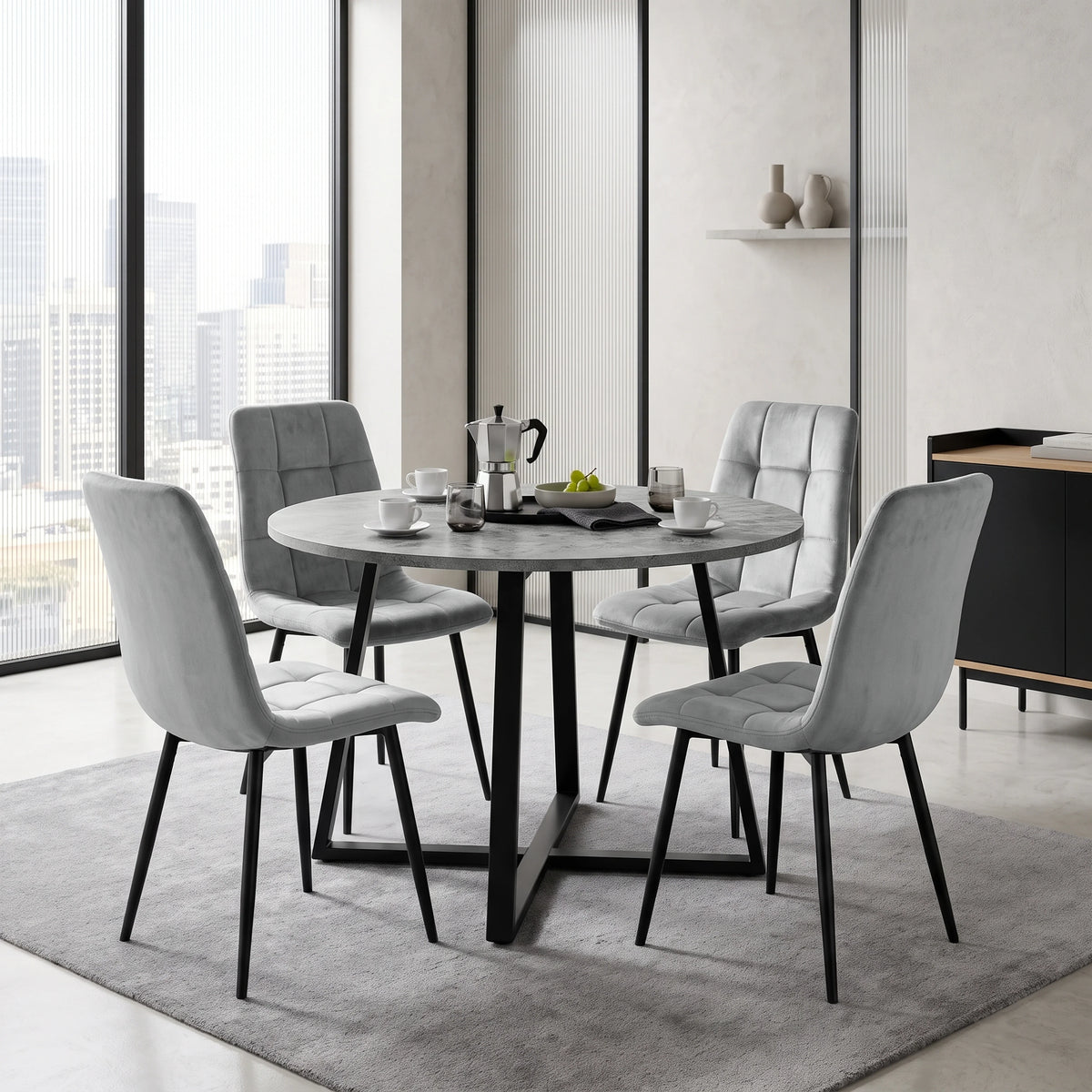 [Light Grey Velvet] Kyvon round dining table set with 4 light grey velvet chairs in a dining room