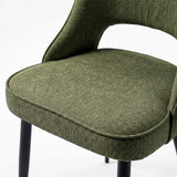 [Green] Close-up of Kyvon 4-seater green upholstered fabric comfy curve chair seat with black metal legs