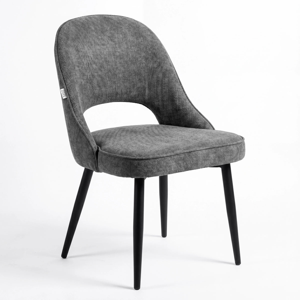 [Grey] Kyvon grey upholstered fabric comfy curve chair angled view with rounded back and cushioned seat