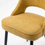 [Mustard] Close-up of Kyvon 4-seater mustard upholstered fabric comfy curve chair seat with black metal legs