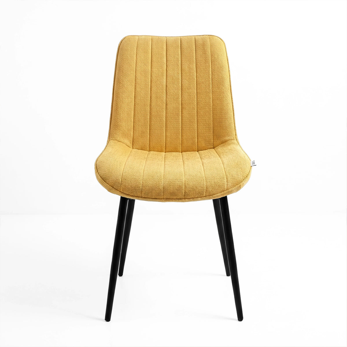 [Vertical Mustard | Clear] Kyvon mustard upholstered fabric channeled stitched dining chair front view with black metal legs
