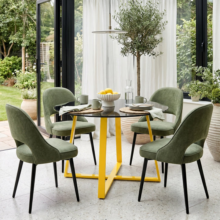 [Green | Tinted] Kyvon round glass dining table set with green comfy curvy chairs and golden iron legs in dining room