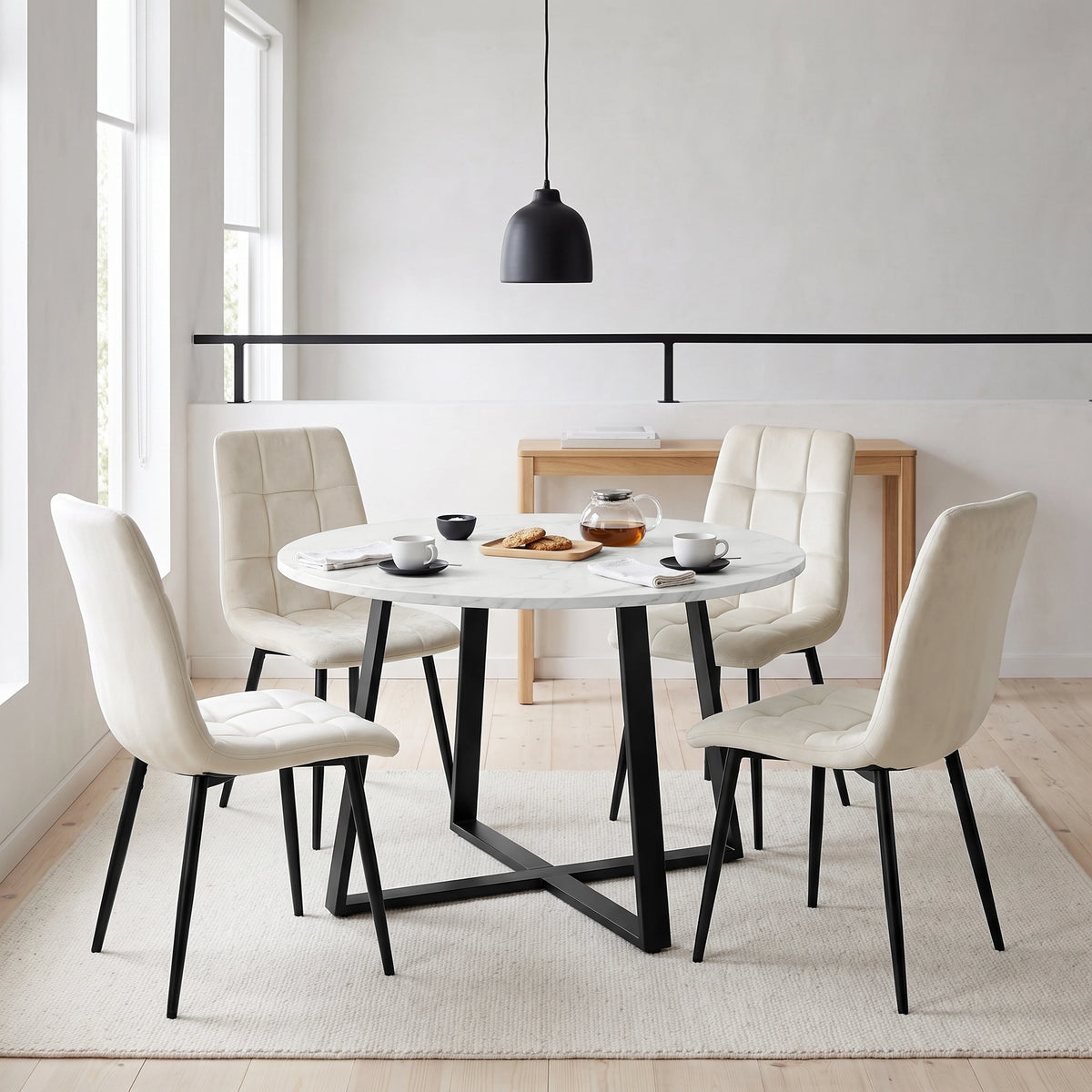[Cream | White Marble] Kyvon round dining table set with 4 cream velvet chairs in a styled room