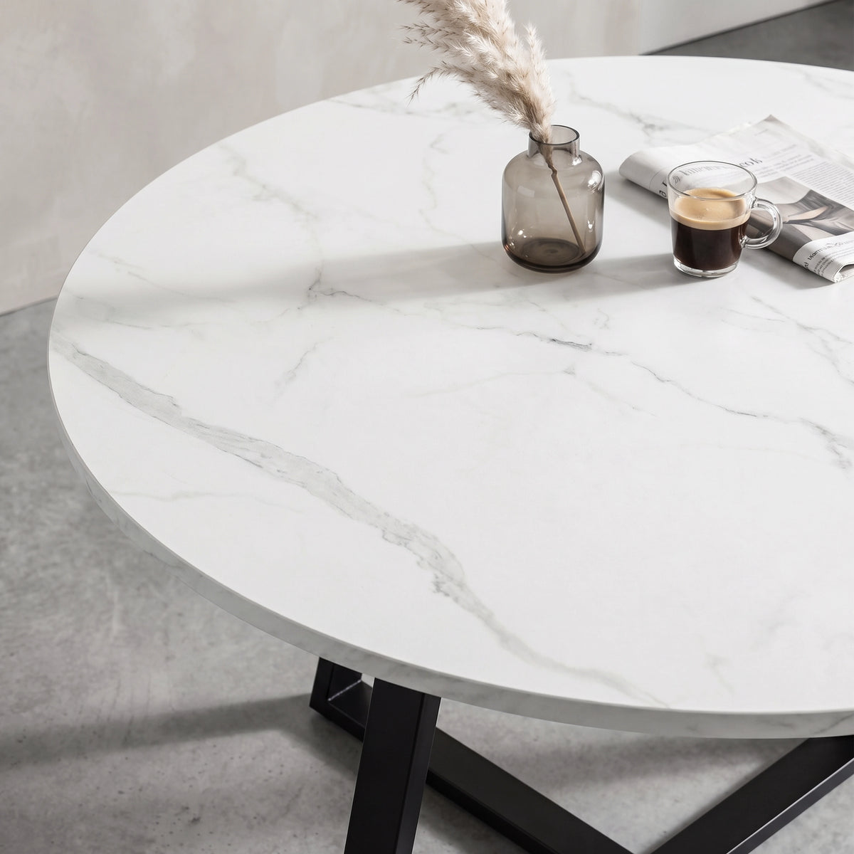 [Light Grey | White Marble] Close-up of Kyvon round dining table set's white marble-effect tabletop and black base