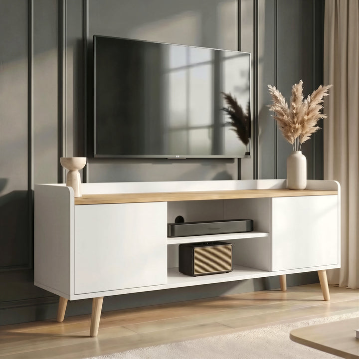 [White | 112 cm] Larvik White TV Unit with Storage for TVs up to 50" positioned beneath a wall-mounted television screen.