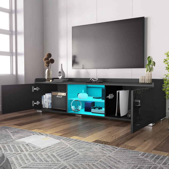 [Black] black TV unit doors-open lifestyle with vase, books on top and blue glow from inside