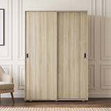 [Light Oak] Torvek closed sliding wardrobe shown front-on with pale wood grain and recessed handles.