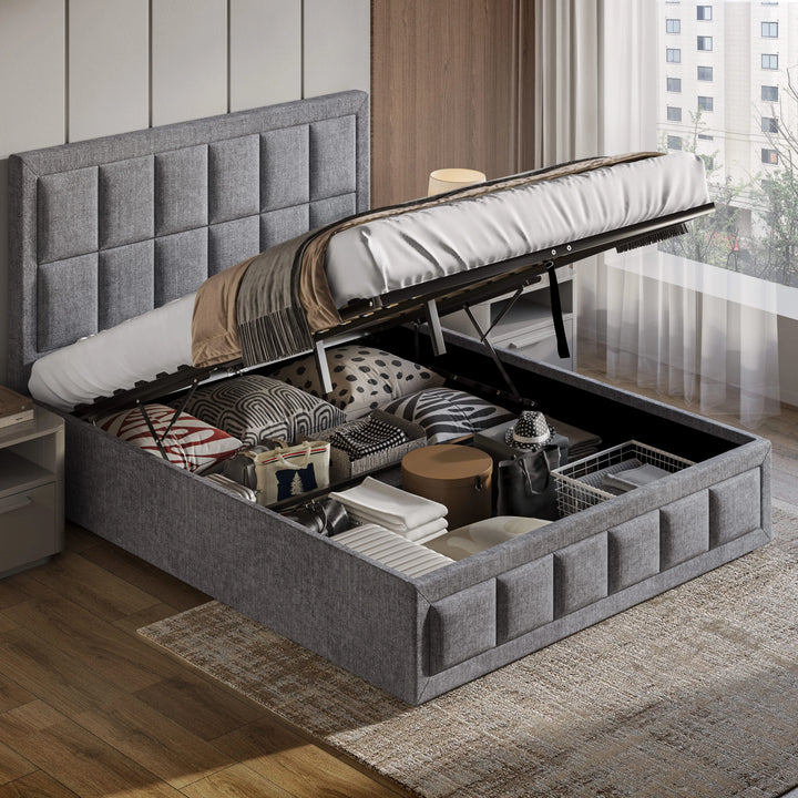 [Super King | Grey] Ottoman bed with gas-lift base raised showing stored pillows, blankets and basket inside compartment