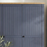 [Blue] Linra wardrobe lower corner detail showing tapered painted leg under base drawer panel