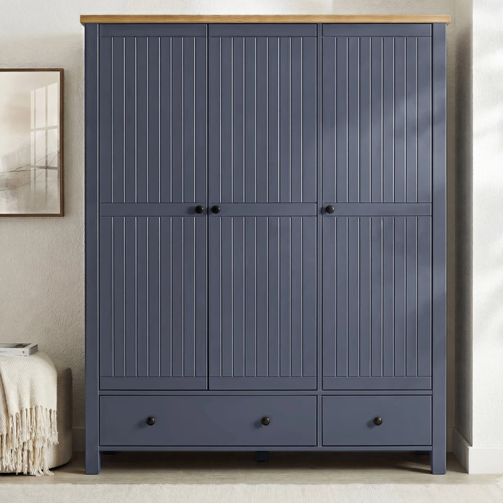 [Blue] Open Linra wardrobe revealing rail of jackets, folded jumpers on shelves, two base drawers