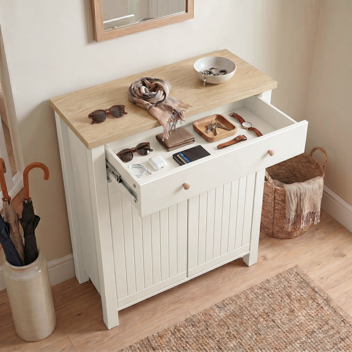 [White] Linra White 4 Tier Painted Shoe Storage Cabinet elevated view showing the top drawer pulled open, revealing compartmentalized storage for wallets, keys, sunglasses, and daily essentials