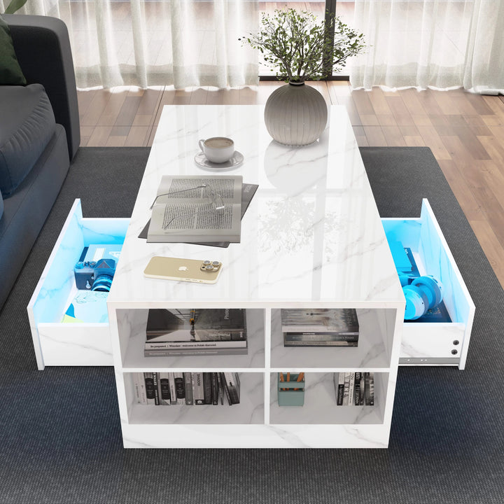 [White Marble] Overhead shot of white marble coffee table showing two open drawers and centre top with cup