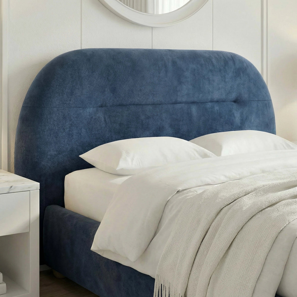 [Blue | Double] Padded headboard detail with wide curved top and stitched channel line viewed from the front 