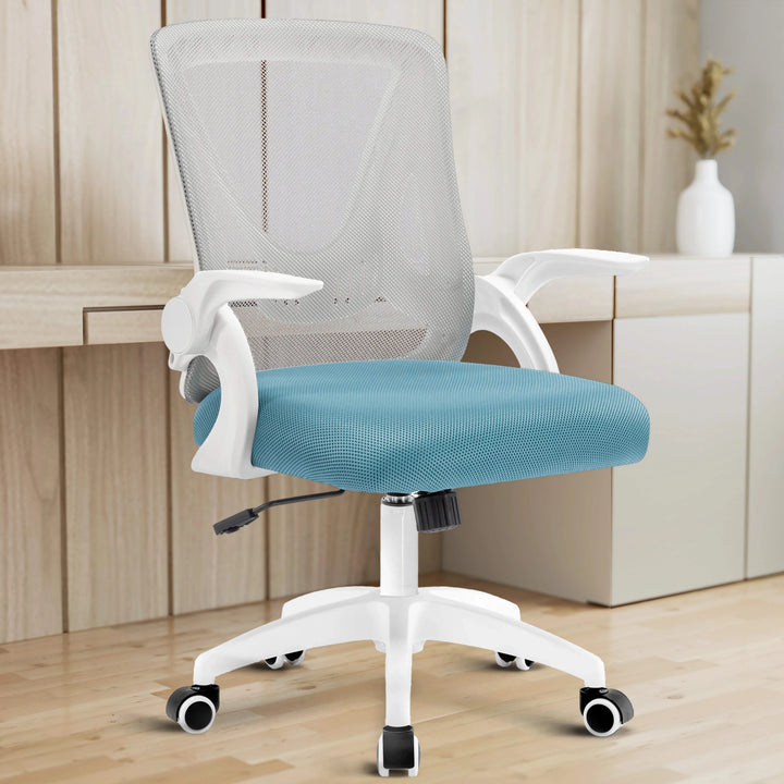 [Grey + Tiffany Blue] A grey and Tiffany blue mesh chair is placed in a home office with a working desk in the background for support.