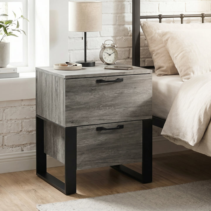 [Wooden Grey] Millwright wooden grey industrial 2-drawer bedside table near a window besidde a metal table