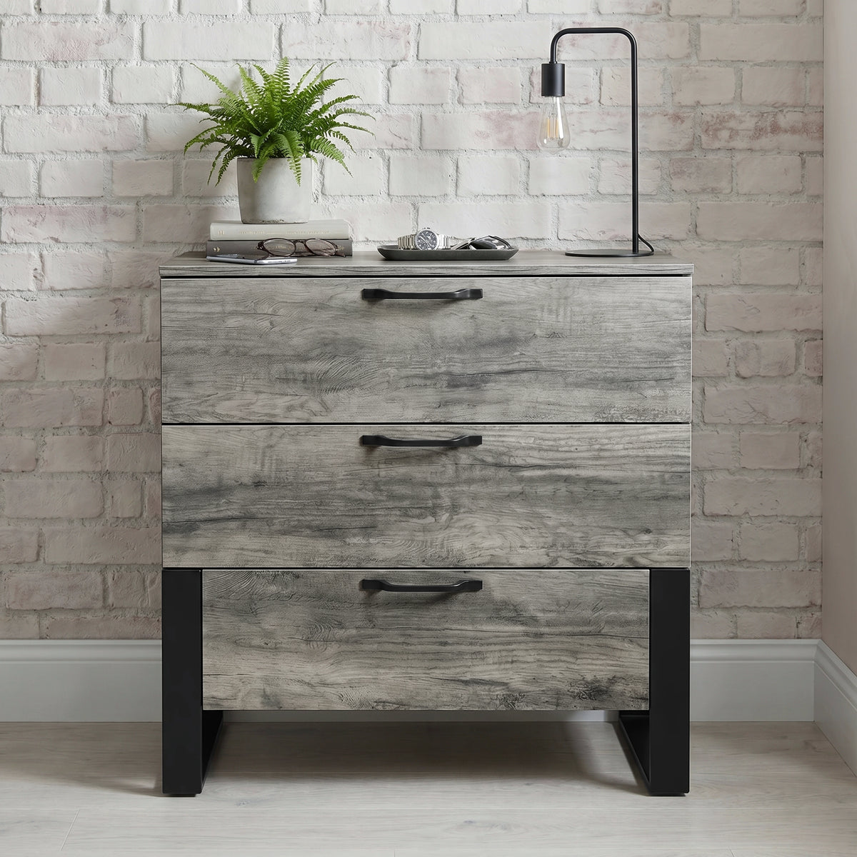[Wooden Grey] Millwright 3 drawer chest of drawers front view with black handles and raised legs