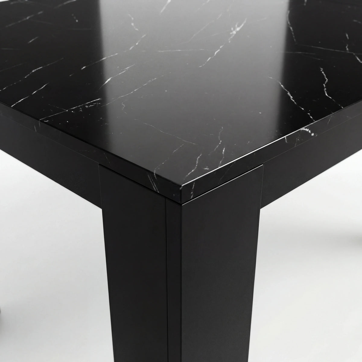 [6 Seater | Grey] Close-up of the Milo black marble-effect tabletop edge, surface texture, and inverted-L leg