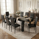[8 Seater | Black] Milo black marble-effect dining table set with 8 high-back chairs in a angled room view