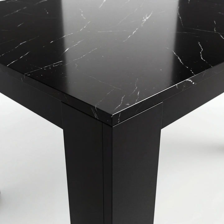 [8 Seater | Black] Close-up of the Milo black marble-effect tabletop edge, surface texture, and inverted-L shaped leg