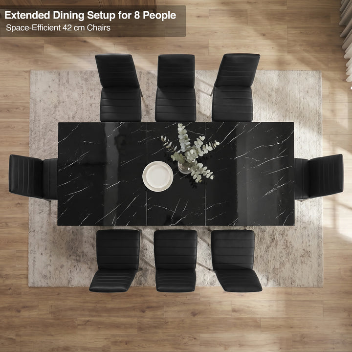 [8 Seater | Black] Overhead view of the Milo black marble-effect extended dining table layout with space-efficient chairs