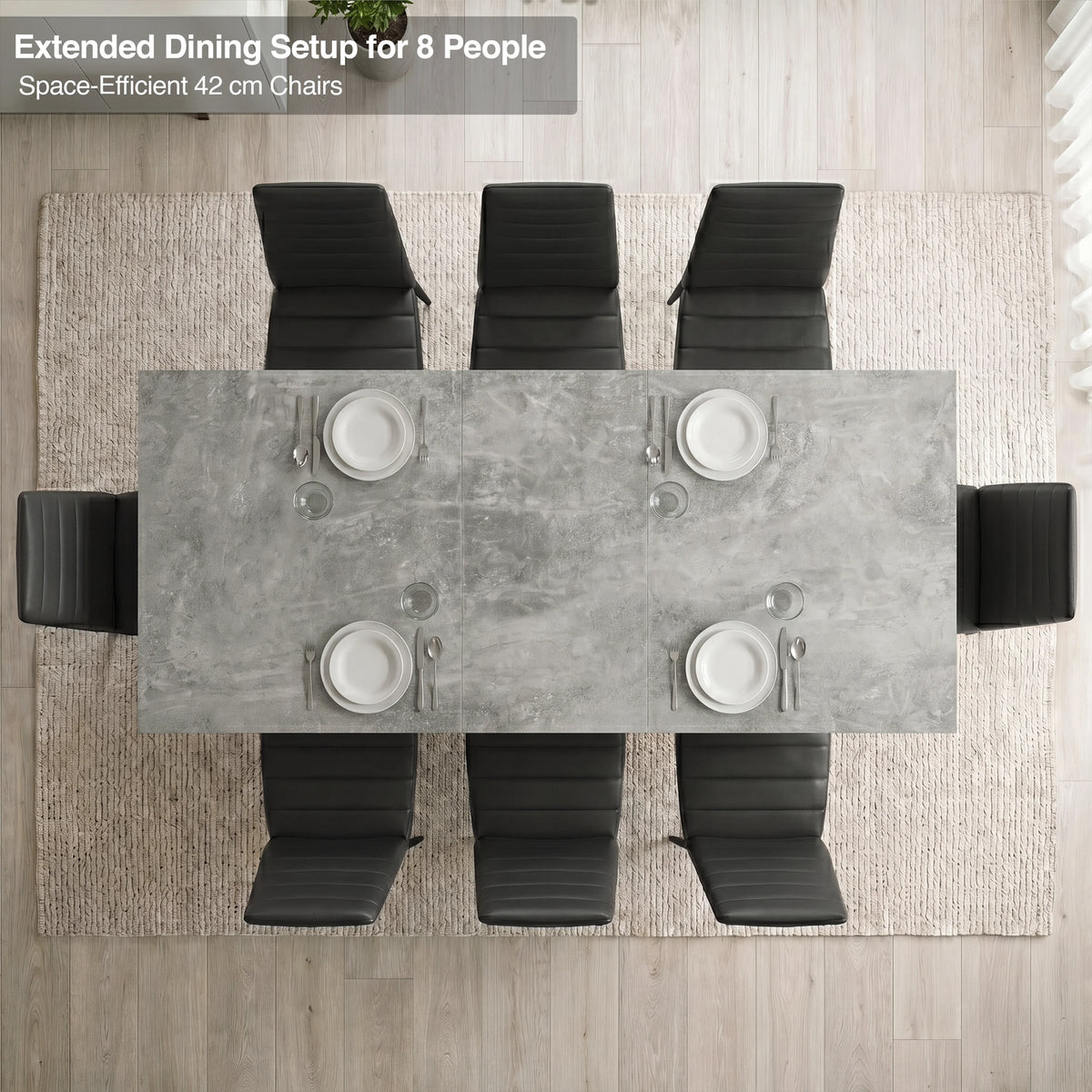 [8 Seater | Black] Milo concrete-effect dining table extended for 8, overhead view with high-back chairs