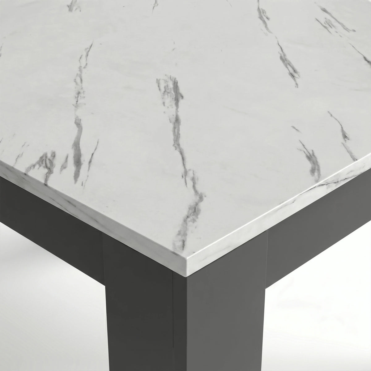 [8 Seater | Black] Close-up of the Milo marble-effect tabletop corner, veining, and inverted L-shaped table leg