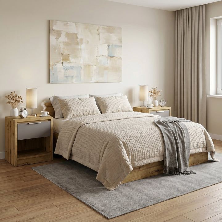 [Oak+Grey] Neatly made bed with beige bedding in a modern bedroom setting.
