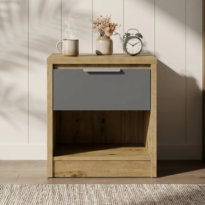 [Oak+Grey] Modern oak bedside table grey drawer head-on with side table lamp and small plant on top