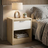 [Wooden Grey+Grey] Wooden grey oak bedside table with grey drawer and open lower shelf styled with lamp and dried grasses