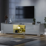 [Grey] TV stand showing yellow colour mode of RGB LED, central shelf lit gold, vases on top