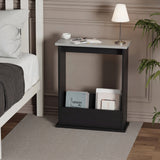 [Grey + Black] grey top black side table styled as bedside next to white bed with reading lamp