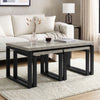 [Grey ] Nestline nesting coffee table in a bright lounge with cream sofa, vase stems, and nested sofa side tables below