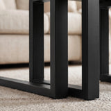 [Grey] Nestline nested coffee table set frame detail with black metal legs aligned beneath the large coffee table