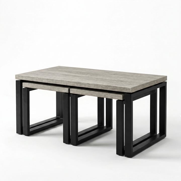 [Grey] Nestline three-piece nested coffee table set shown on a clean white background with an angled front