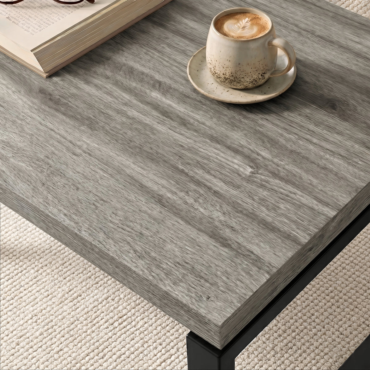 [Grey ] Nestline nesting coffee table set tabletop grey wood grain detail with a small cup 