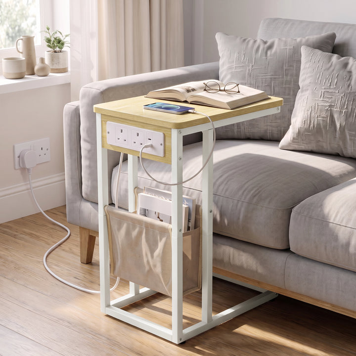 [Oak] C-shaped side table by sofa with oak-effect top, socket panel, beige pouch and sofa base