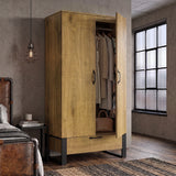 [Oak Effect] wooden wardrobe with a light oak finish and black metal legs, shown open in a bedroom setting next to a bed and window.