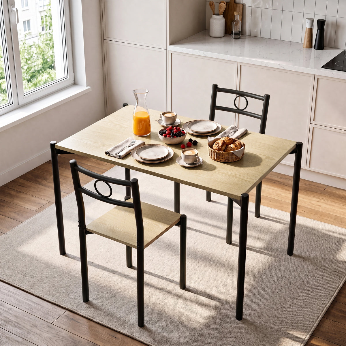 [Oak] Kitchen breakfast scene with the table set for two, plates, coffee cups, berries, bread, orange juice and cutlery
