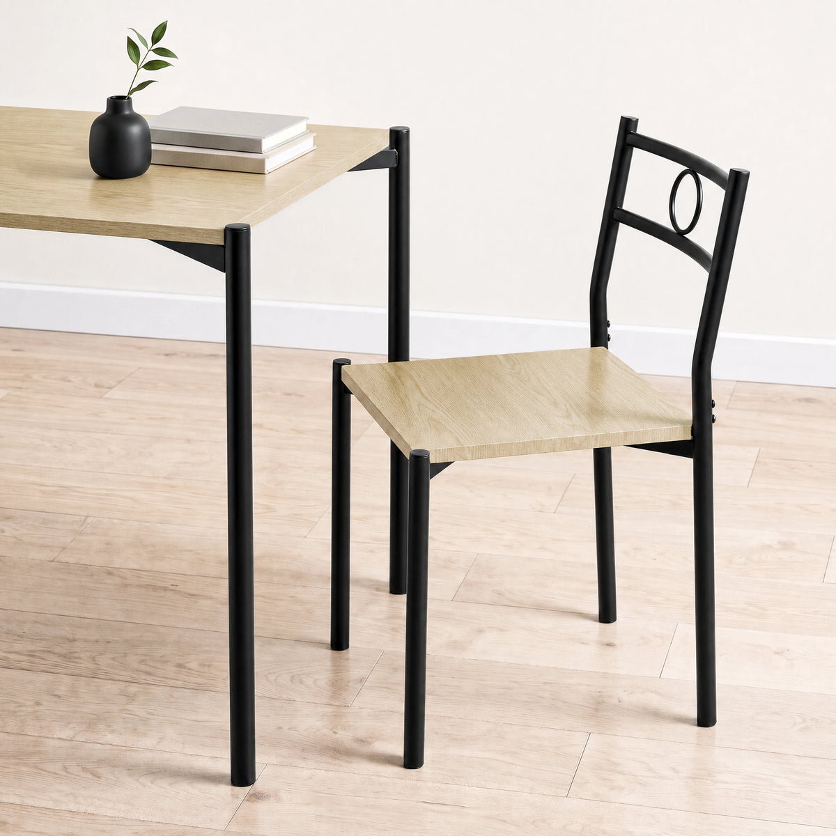 [Oak] Close-up showing the tabletop edge, chair seat, round-pipe legs and circular chair-back design