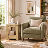 [Oak] Square side table in a living room beside an armchair, with a basket and folded throw in the open lower storage