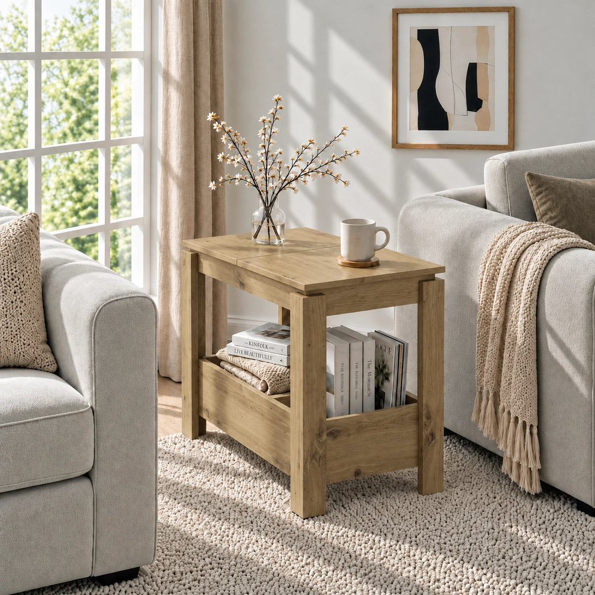 [Oak] Sunlit living room with a narrow side table beside a sofa, a blossom vase on top and books stored below.