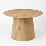 [Oak] 120cm round pedestal dining table with tapered slatted pedestal base in a studio shot