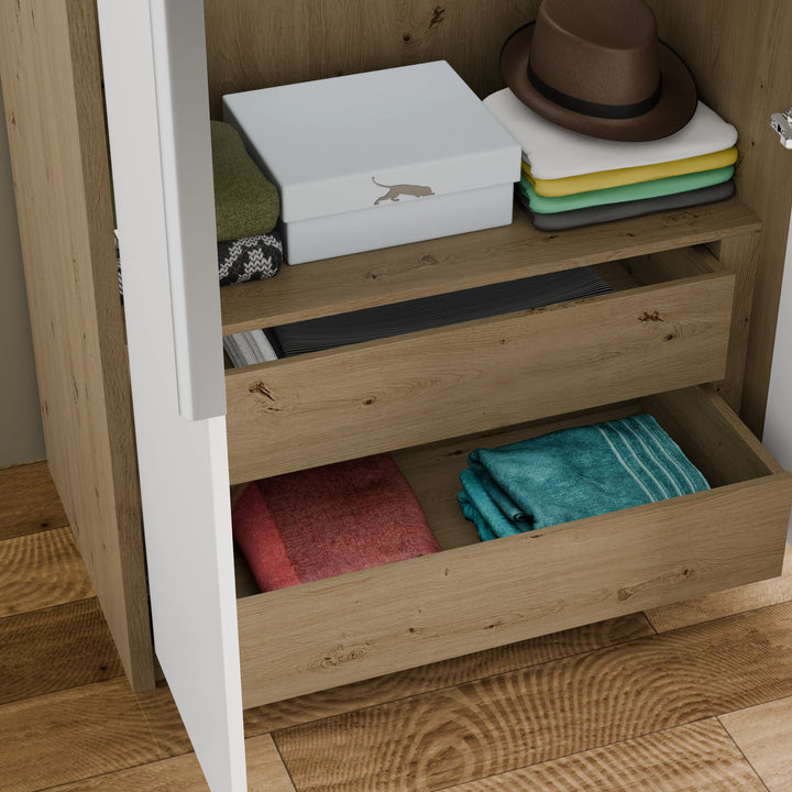 [Oak+White] Close-up of Skova wardrobe oak internal drawers pulled open holding folded towels, hat and storage box on shelf
