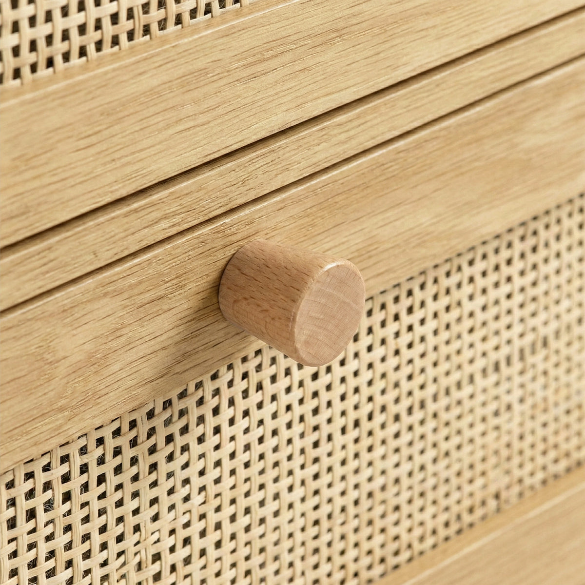 [Oak Effect] Wovena rattan wardrobe detail of natural rattan mesh against the upper drawer's wood grain surface
