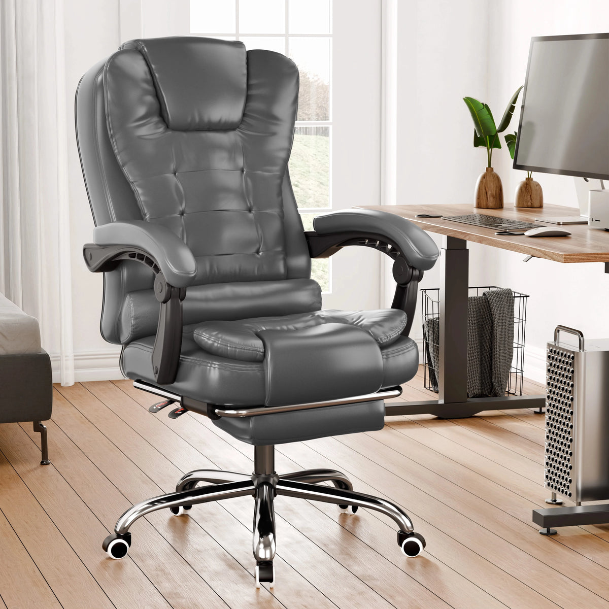 [Grey] Grey office chair in a home office setting with a desk and computer.