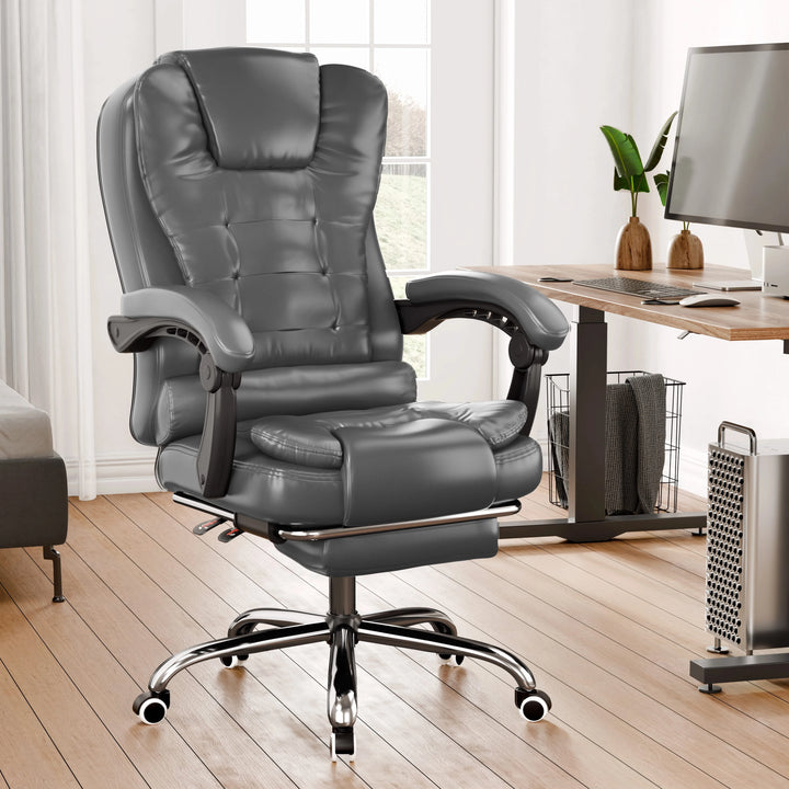 [Grey] Grey office chair in a home office setting with a desk and computer.