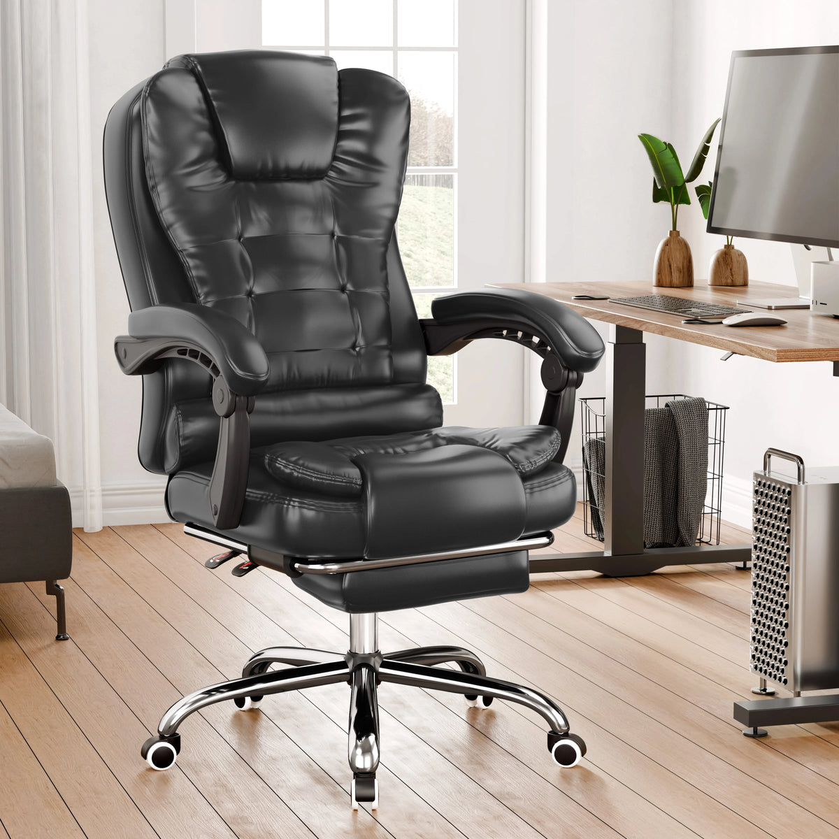 [Black] Black office chair in a home office setting with a desk and computer.