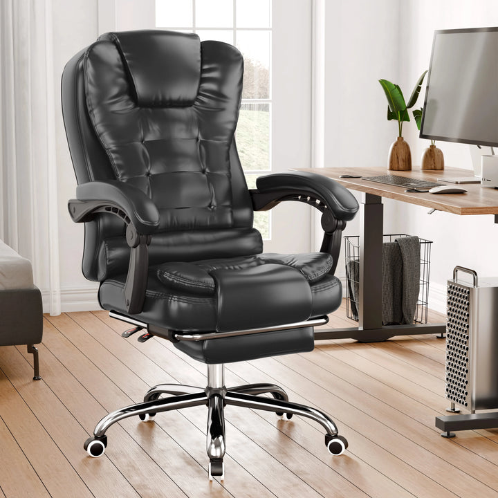 [Black] Black office chair in a home office setting with a desk and computer.