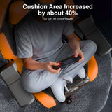 [Black + Orange] Person sitting on a massage chair with text indicating increased cushion area.