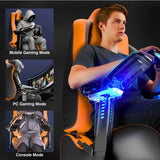 [Black + Orange] Gaming chair with mode indicators for mobile, PC, and console gaming, featuring a person using a controller.